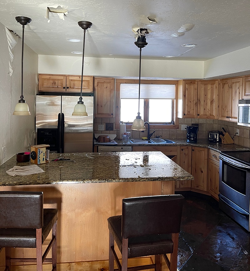 Flooded kitchen and water damage in mountain home